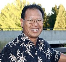 Picture of Dr. Leong smiling.